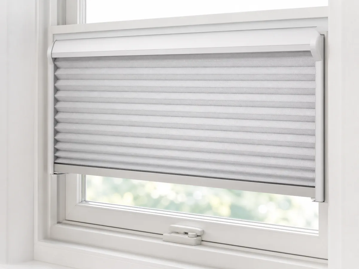 Close editorial detail of the same window showing the frame surfaces, usable depth, and operating clearance without numbers or labels.